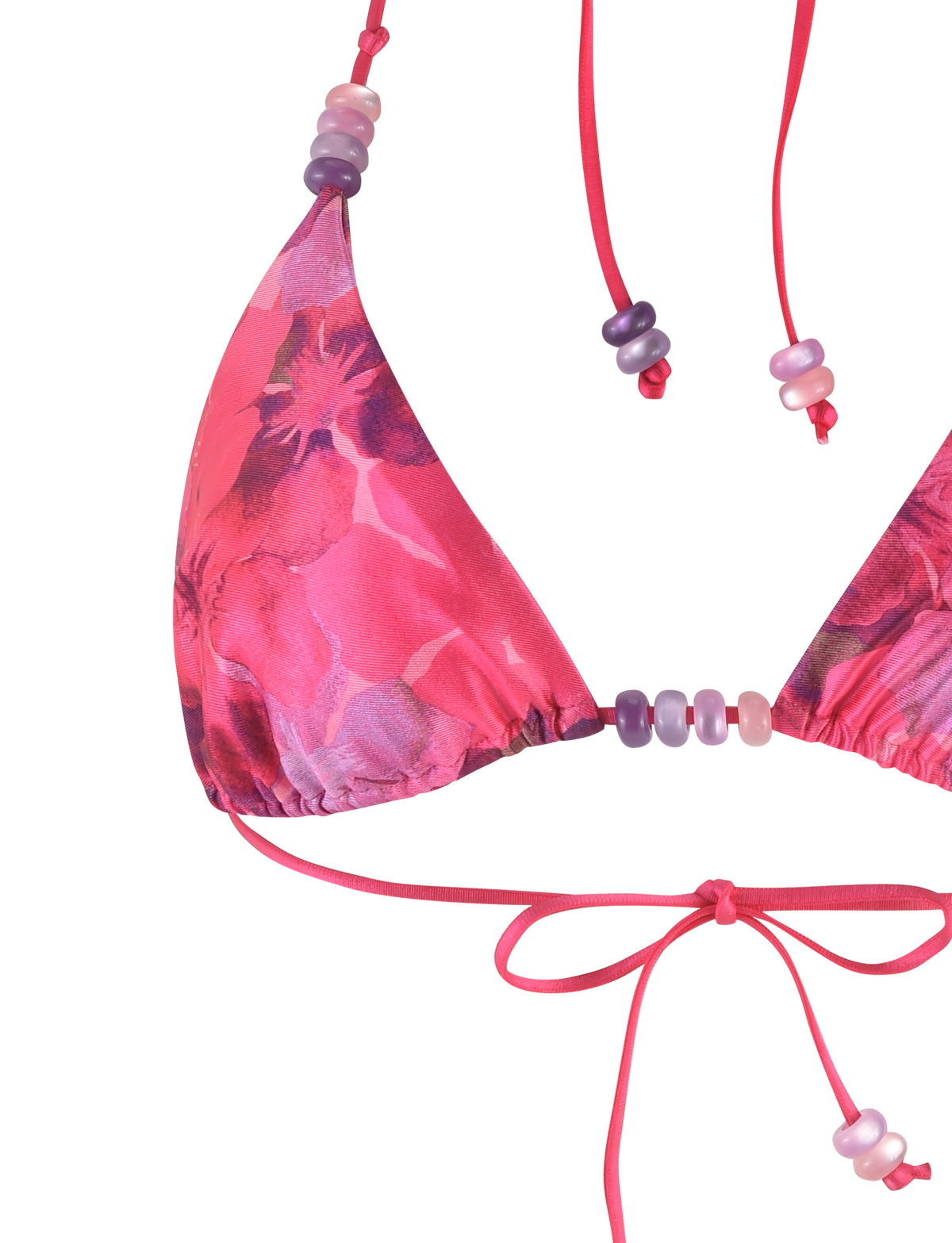Close-up of the TIGERMIST FINLEA BIKINI TOP - PINK : HIBISCUS, featuring a pink hibiscus floral print, string ties, and decorative beads for adjustable styling.