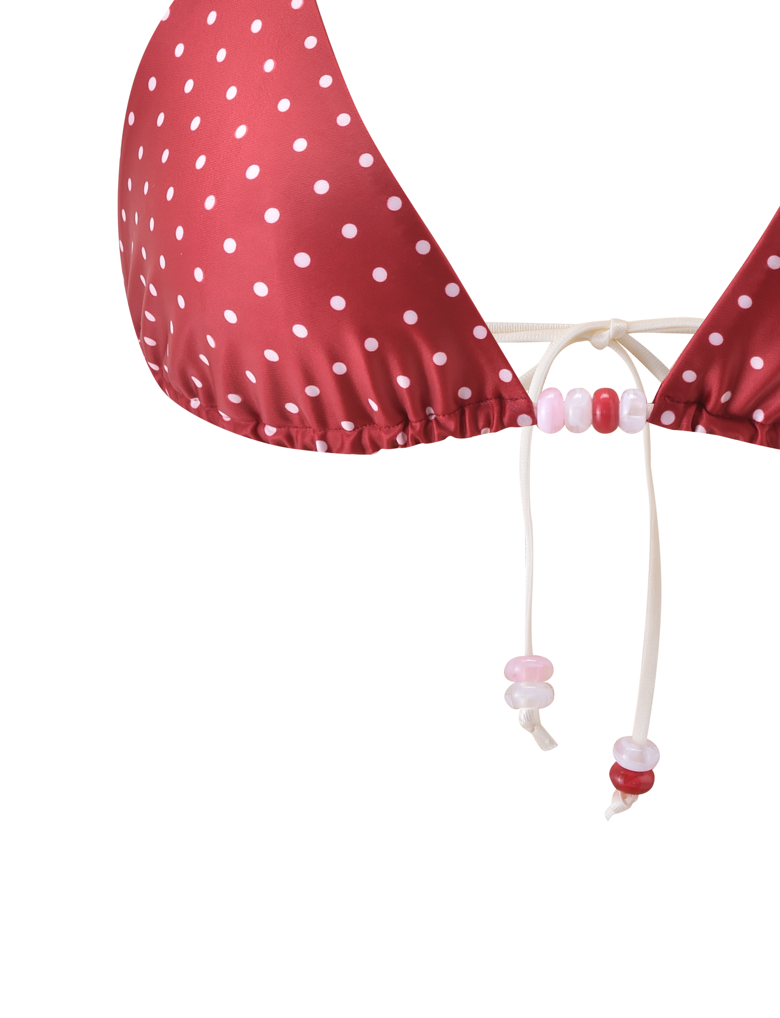 Close-up of the TIGERMIST FINLEA BIKINI TOP in red and cream polka dot, featuring a halter neck with white drawstrings, pink, white, and red beads, shown against a plain white background.