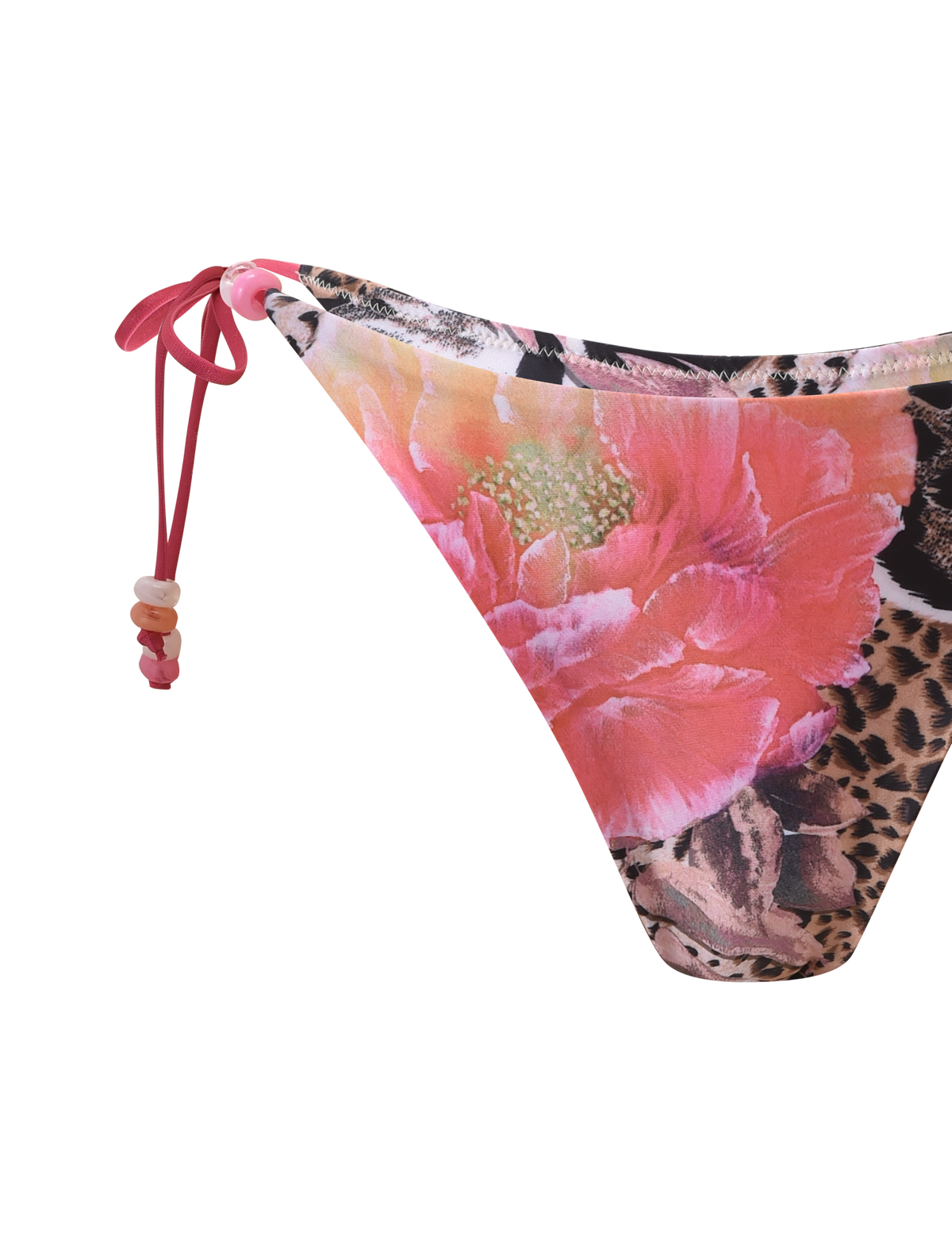 Close-up of the TIGERMIST FINLEA BIKINI BOTTOM - ANIMALIER FLORAL in a cheeky cut, showcasing a vibrant animal floral print with pink beaded side ties, set against a white background.