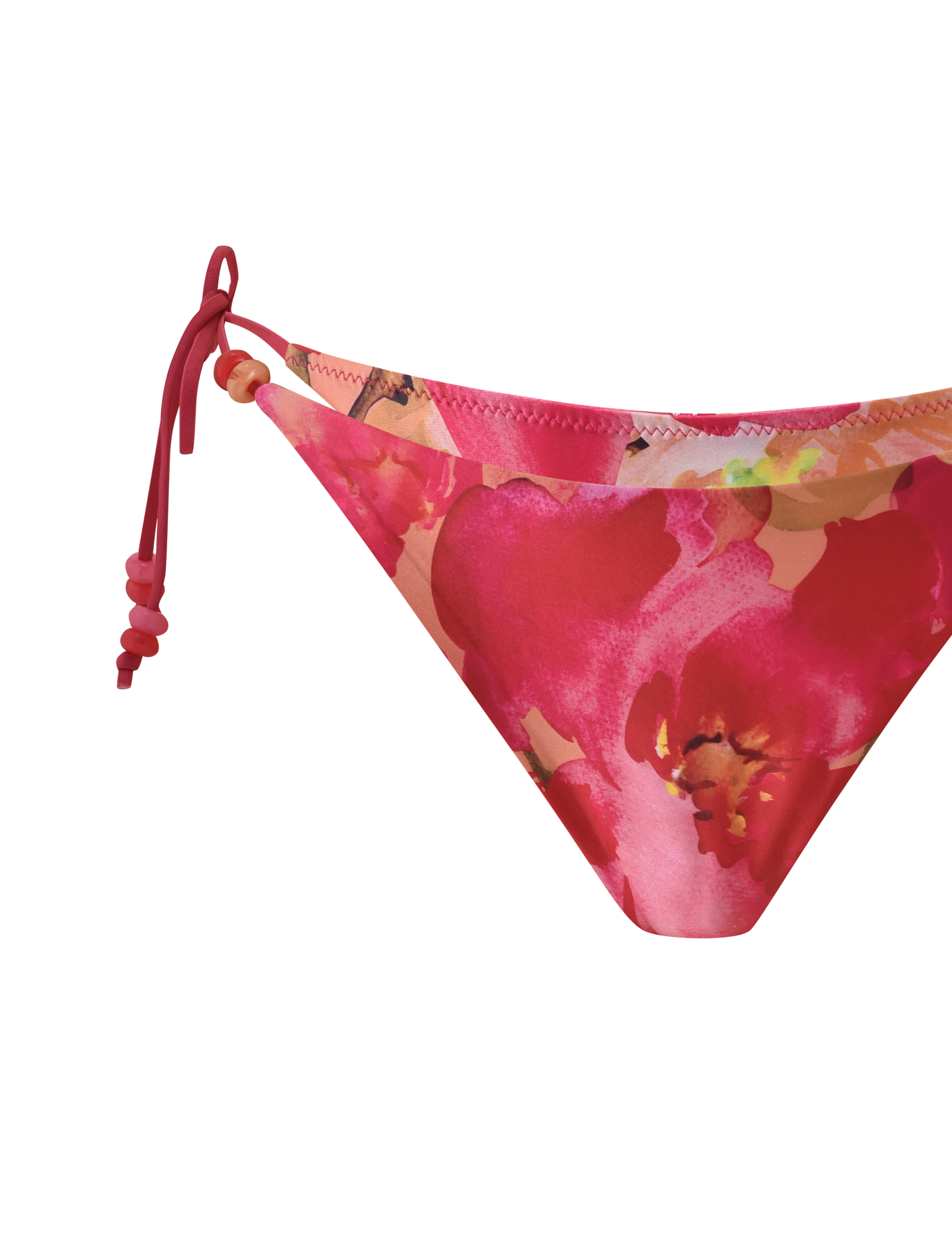 Close-up of the TIGERMIST FINLEA BIKINI BOTTOM - DAIQUIRI FLORAL, a cheeky brief featuring red side ties and a vibrant pink floral watercolor pattern in shades of pink, red, and orange on white.