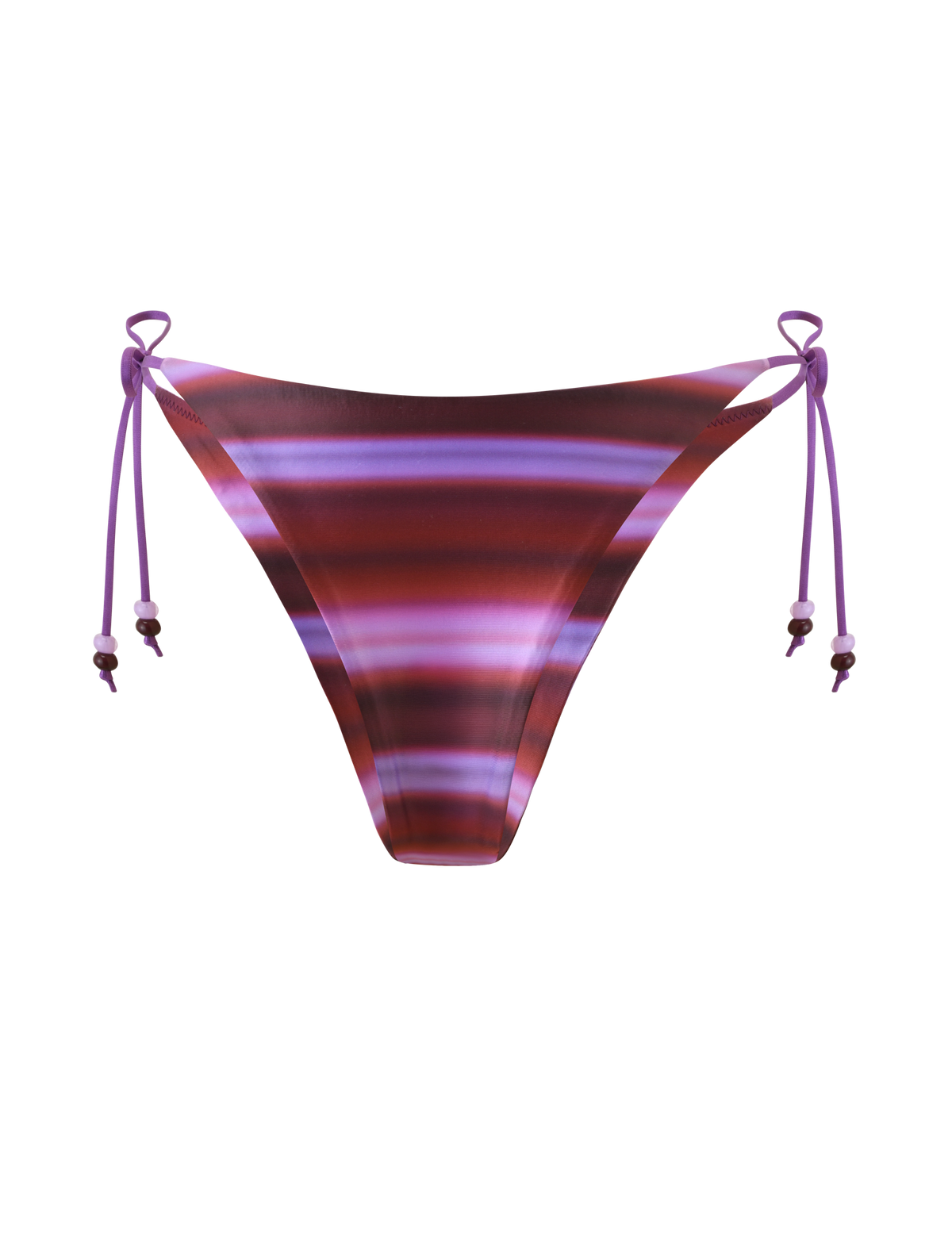 The TIGERMIST FINLEA BIKINI BOTTOM - DUSK OMBRE STRIPE features a cheeky cut with maroon, pink, and ombre purple stripes, plus adjustable purple side ties with beaded ends. Shown on a plain white background.
