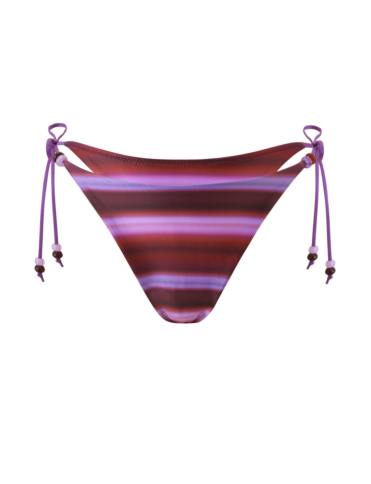 The TIGERMIST FINLEA BIKINI BOTTOM - DUSK OMBRE STRIPE features purple and pink stripes, a cheeky cut, ombre effect, and side tie strings with small beads, shown on a plain white background.