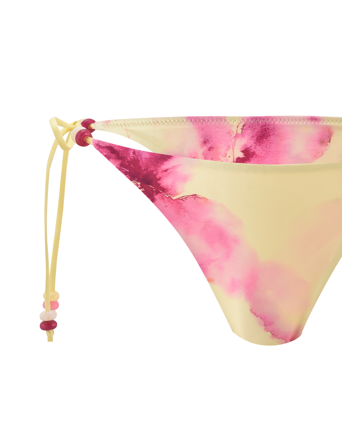 A close-up of the TIGERMIST FINLEA BIKINI BOTTOM - WATERCOLOUR FLORAL shows a cheeky fit in pink and yellow with adjustable side ties, finished with pink and red beads.