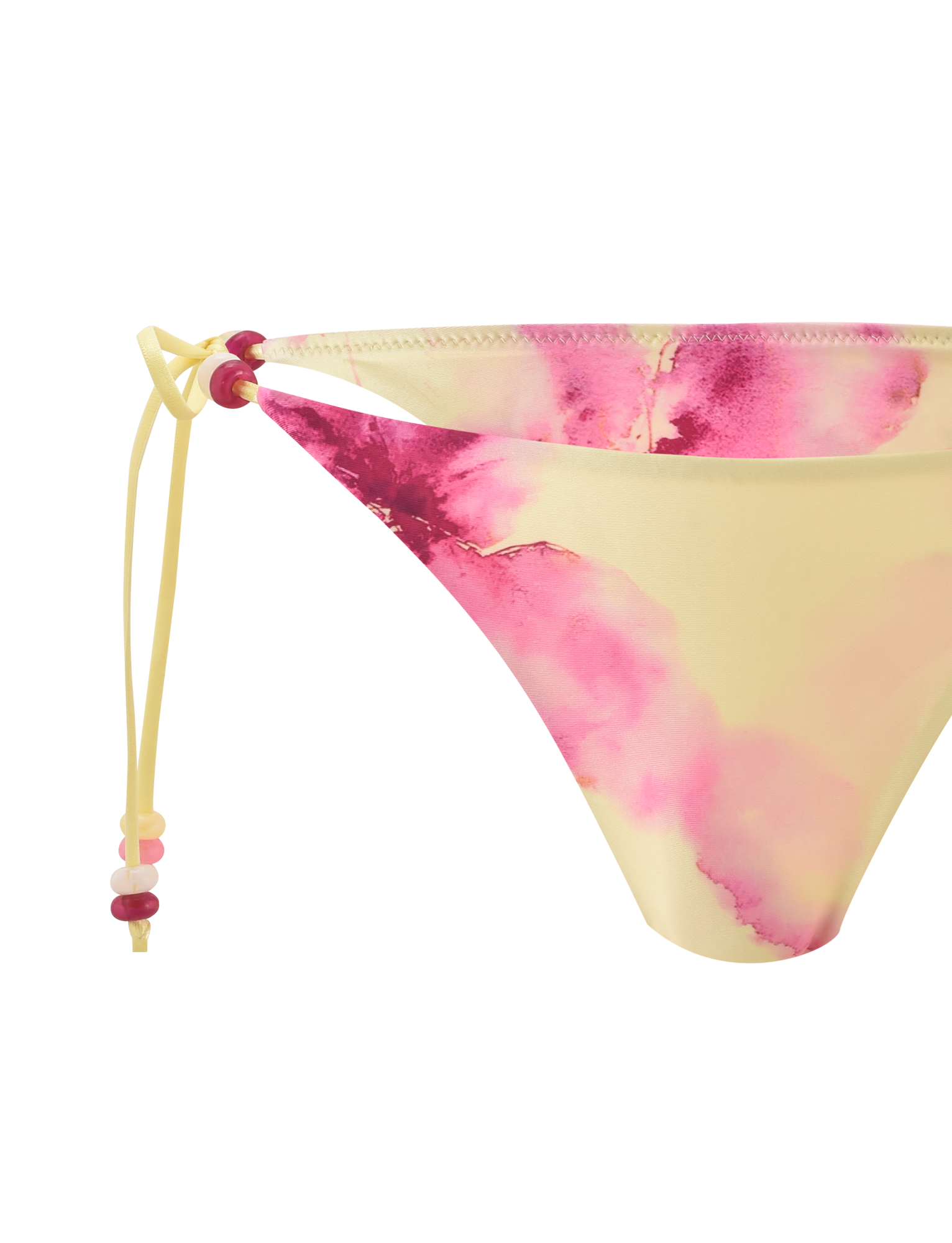 A close-up of the TIGERMIST FINLEA BIKINI BOTTOM - WATERCOLOUR FLORAL shows a cheeky fit in pink and yellow with adjustable side ties, finished with pink and red beads.