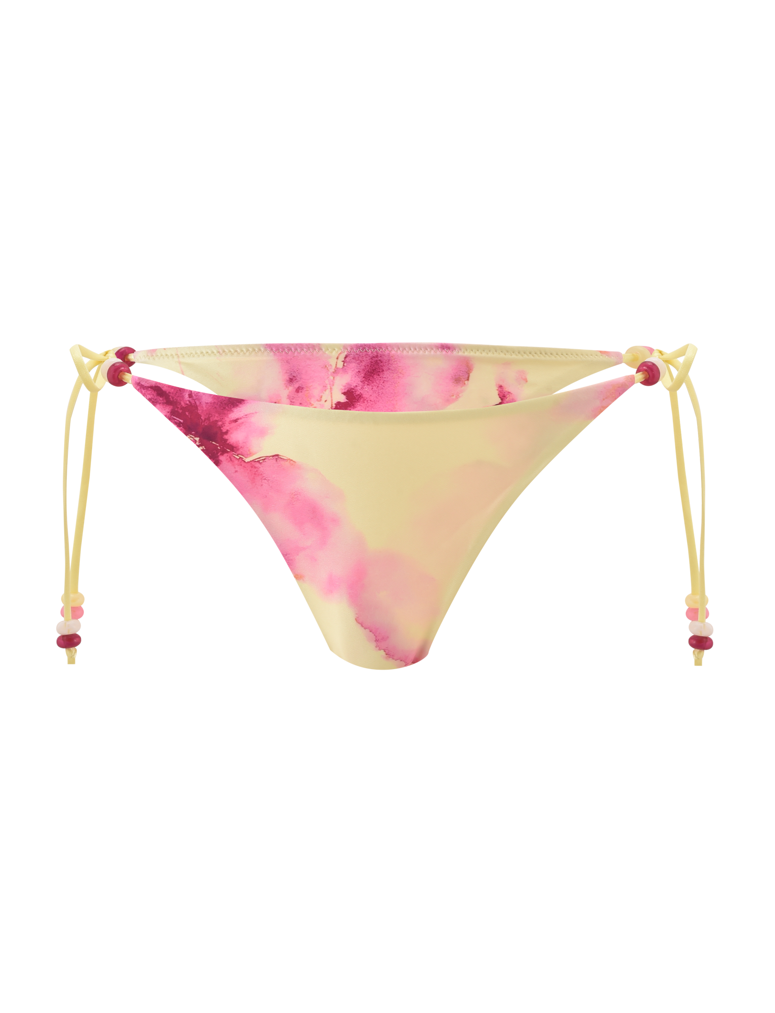 The FINLEA BIKINI BOTTOM - WATERCOLOUR FLORAL by TIGERMIST features a yellow cheeky cut with a pink tie-dye floral pattern, adjustable side ties, and playful pink and red beaded details, shown on a plain white background.