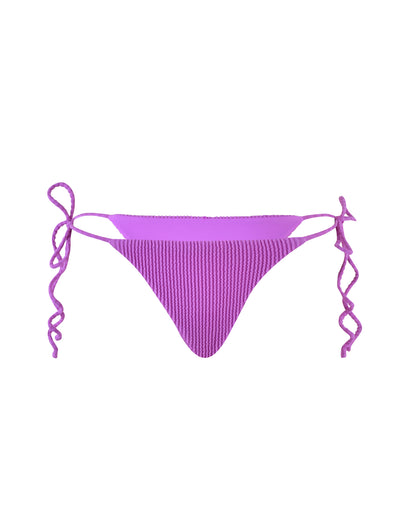 The Yve Bikini Bottom from Tiger Mist, in a stunning violet hue, features a ribbed texture and comes with adjustable side ties that are long enough to be styled into bows.