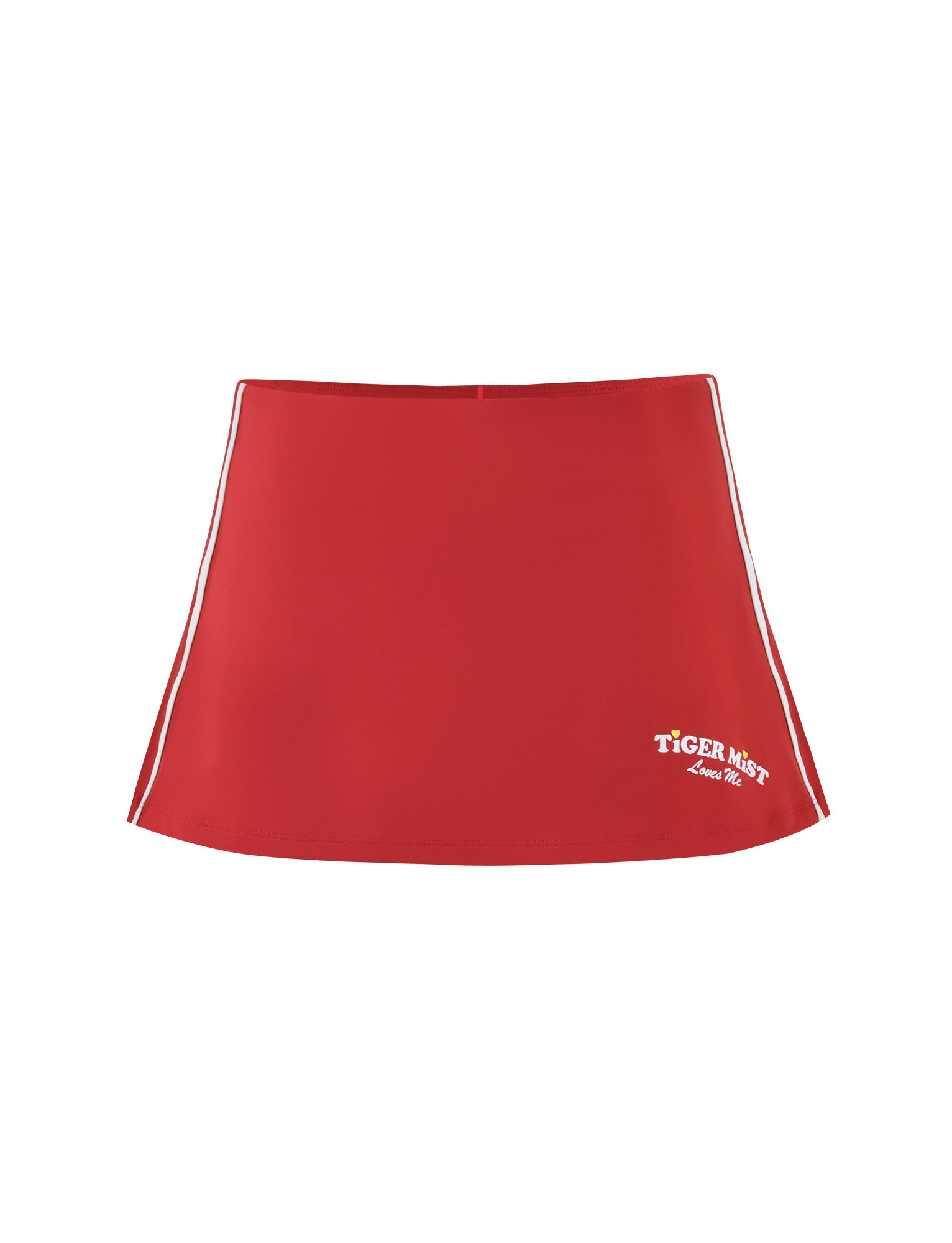 The DELANEY SKORT - RED by TIGERMIST is a stylish red mini skort featuring a white embroidered "TIGER MIST Love Me" logo on the bottom right. Its sporty white side stripes make it perfect for casual wear, combining simplicity with fashion.