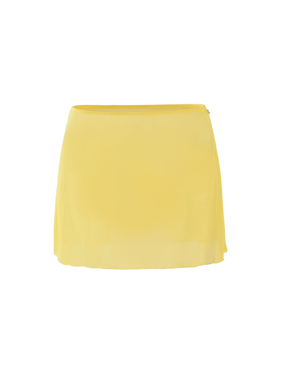 The CYNTHIA MINI MESH SKIRT in pale yellow from TIGERMIST is a short skirt made of sheer, flowing fabric. It features a simple, minimalist design with a slight flare at the hem and no visible patterns or embellishments.