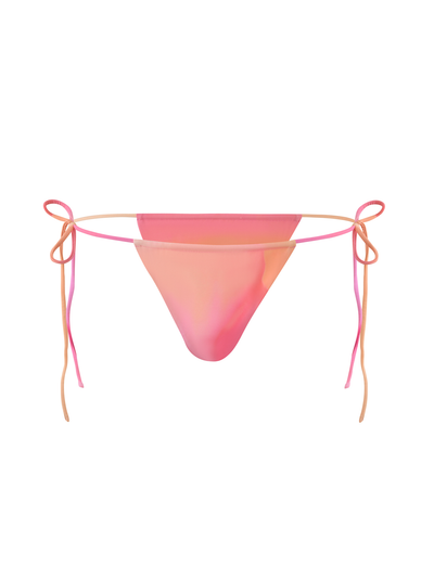 The TIGERMIST KHESSA BIKINI BOTTOM - PINK HIBISCUS features a pink and peach gradient, bodycon fit, and adjustable side ties, shown isolated on a white background.