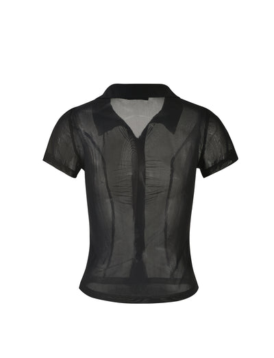 The AHLING TOP - BLACK from TIGERMIST is displayed against a white background. This black short-sleeved sheer blouse features a button-down front and a classic collar, with the transparency of the fabric revealing the silhouette of the mannequin underneath.