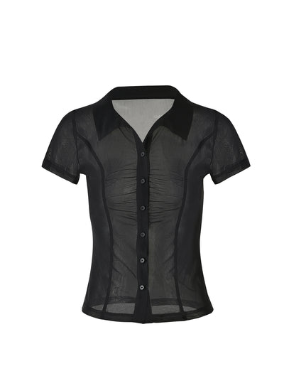 The AHLING TOP - BLACK from TIGERMIST is a sheer, black, short-sleeved blouse featuring a button-up front and pointed collar. This transparent fabric offers a delicate and lightweight texture, while the form-fitting design includes subtle ruching along the bodice.
