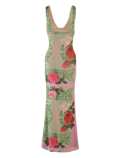 Introducing the LUNARIA DRESS - MULTI : MACRO FLORAL : SUMMER ROSE by TIGERMIST, a stunning long, sleeveless gown featuring a deep V neckline. This elegant dress boasts a soft beige top that seamlessly transitions into a green and pink patterned bottom, adorned with large red and pink roses and green leaves. The overall design is both sophisticated and visually captivating.