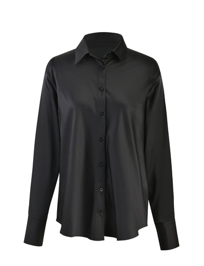 The ALINA SHIRT - BLACK from TIGERMIST is a black, long-sleeved button-up shirt crafted from smooth, shiny fabric. This shirt boasts a classic collar, single cuffs, and a straight hem, offering a simple and elegant design ideal for both formal and casual occasions.