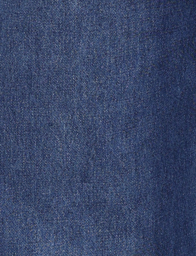 A close-up view of the AVEREE JEAN - BLUE : DARK WASH from TIGERMIST showcases its coarse texture and characteristic weave pattern. The fabric demonstrates a uniform appearance with shades of indigo blue and visible fibers, embodying the classic jeans material.