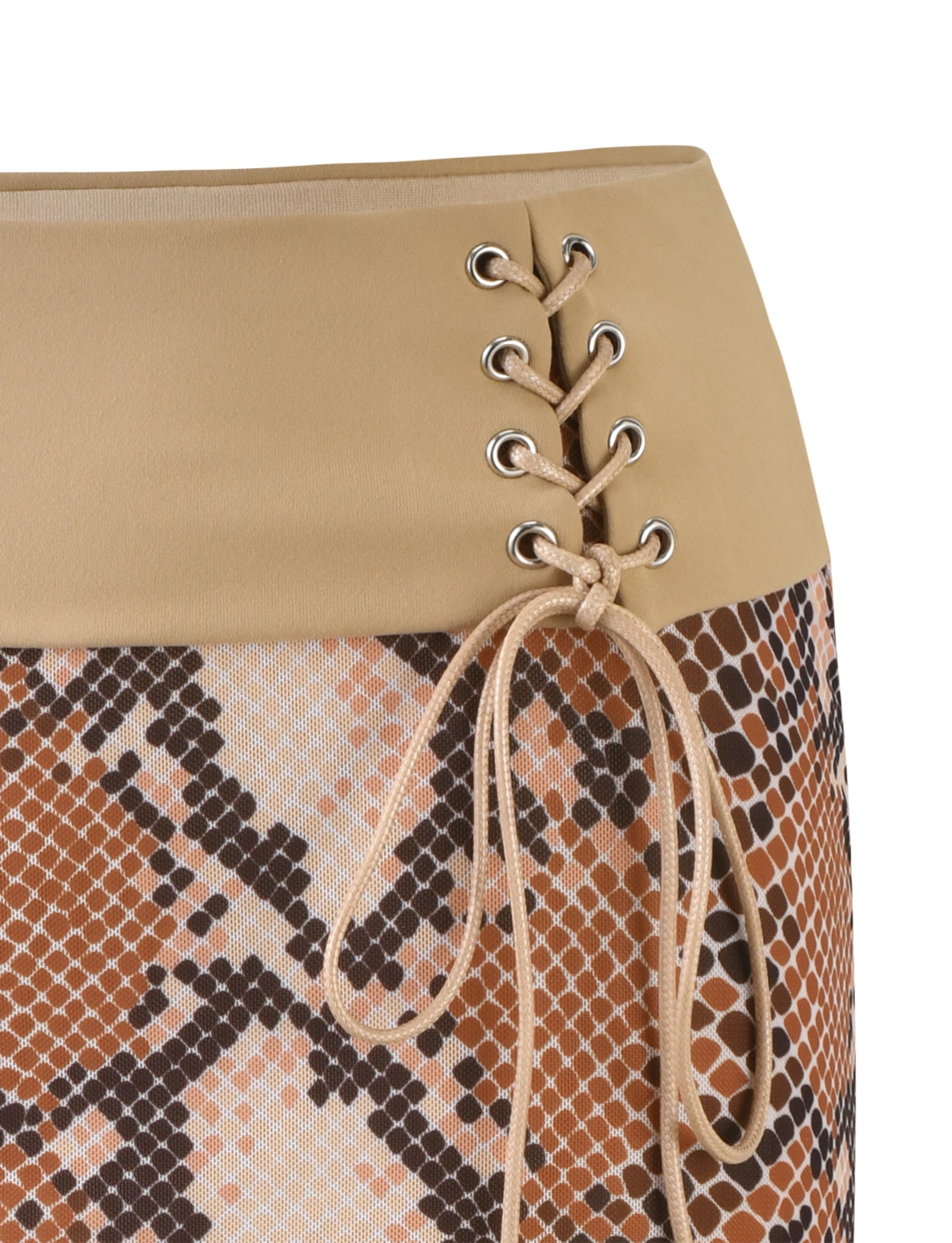 Close-up of the TIGERMIST FALLON SKIRT - BROWN : SNAKE featuring a snakeskin pattern in brown, black, and white hues. The skirt boasts a beige waistband with lace-up corset-style detailing, metal eyelets, and a bow made from the laces.
