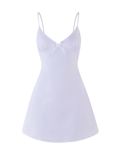 The TIGERMIST WINNIE MINI DRESS - WHITE features thin adjustable straps and a small bow at the V-shaped neckline, shown against a plain background.