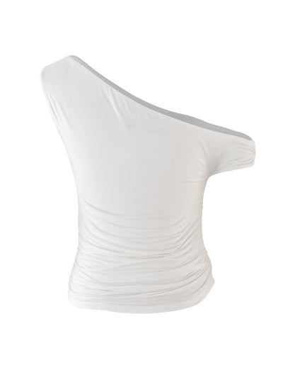 The KADENCE TOP - WHITE from TIGERMIST is displayed against a white background. This asymmetrical, one-shoulder top features ruching on one side, creating a gathered effect at the waist and offering a fitted look.