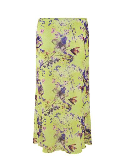 The KELLAN SKIRT - GREEN : BY POPPY FLORAL by TIGERMIST is a long and flowy skirt with a light green base color, adorned with an eye-catching floral and abstract pattern in shades of purple, pink, and blue. This skirt features a straight, relaxed silhouette that captures the chic essence of TIGERMIST.