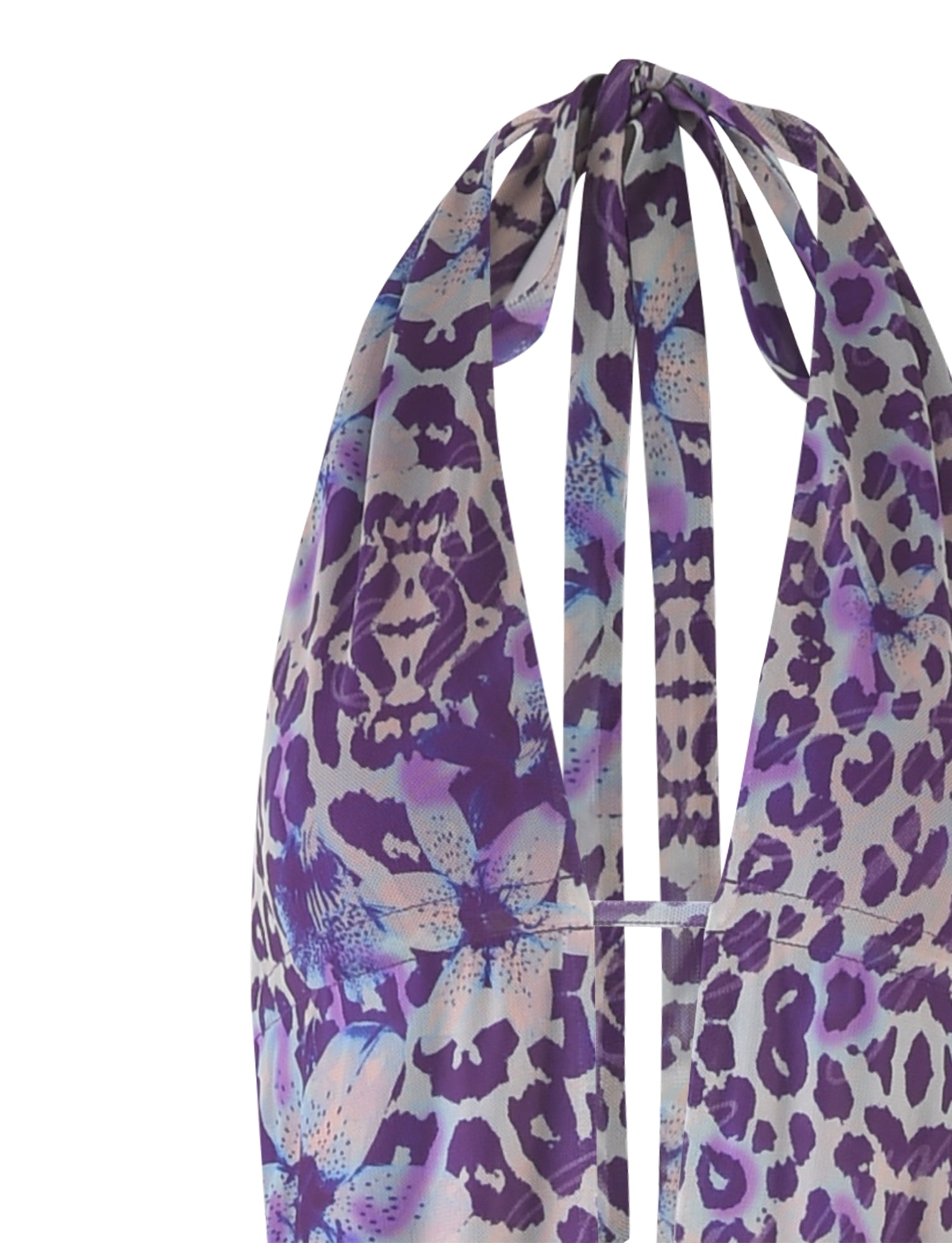 A close-up image of the MAGDALENA MAXI DRESS from TIGERMIST, showcasing a vibrant mixed print design that features a purple floral and leopard pattern. The dress has tied straps at the neck and an open back.