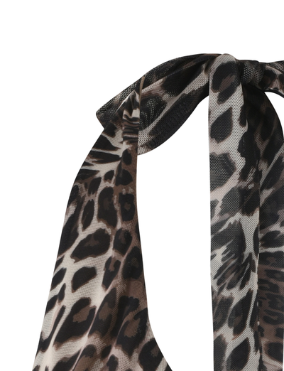 Close-up of the TIGERMIST PEARL TOP - MULTI : LEOPARD, featuring a tied bow and high-stretch leopard print fabric against a white background.