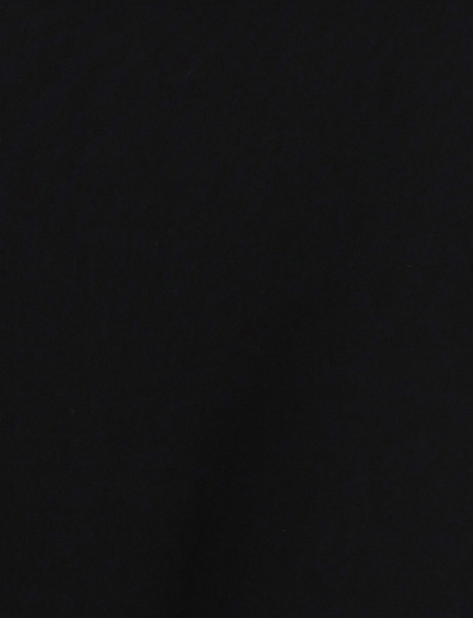 A completely black image with no discernible patterns or objects visible, resembling the sleek uniformity of the CASPIAN DRESS - BLACK by TIGERMIST. The entire frame is uniformly dark.