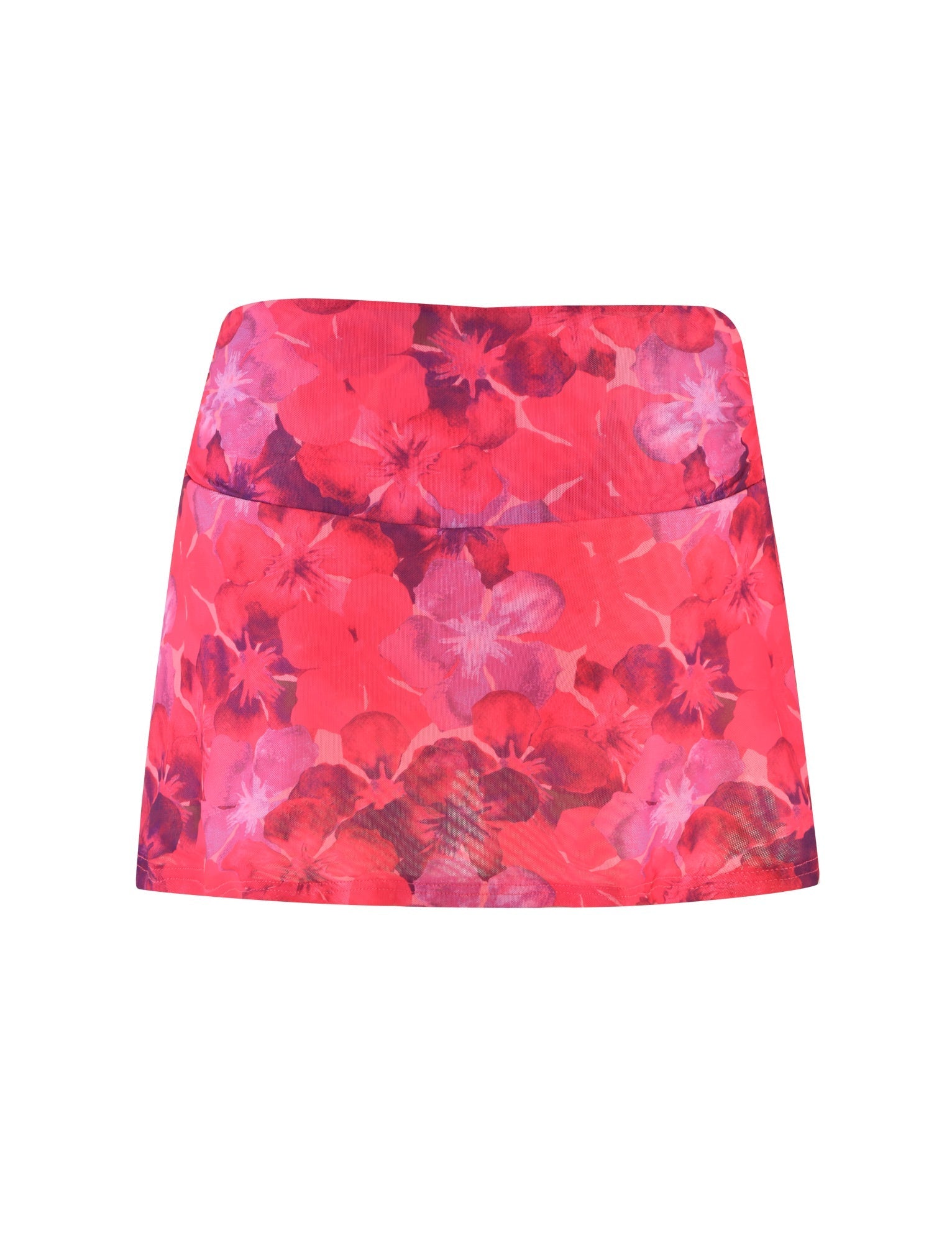 The AMETHYST SKORT - PINK : HIBISCUS by TIGERMIST features a colorful pink floral design with vibrant shades of red, pink, and purple. Styled with a simple, straight hemline that sits above the knee, this skort combines mesh fabrication for an airy feel and is displayed on a white background.