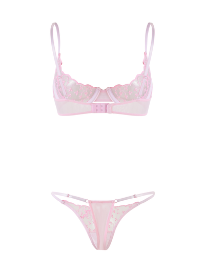The TIGERMIST TALIYAH SET - PINK is a baby pink lingerie set with embroidered mesh floral details, featuring a sheer underwire bra with adjustable straps and a matching sheer thong for a feminine touch.
