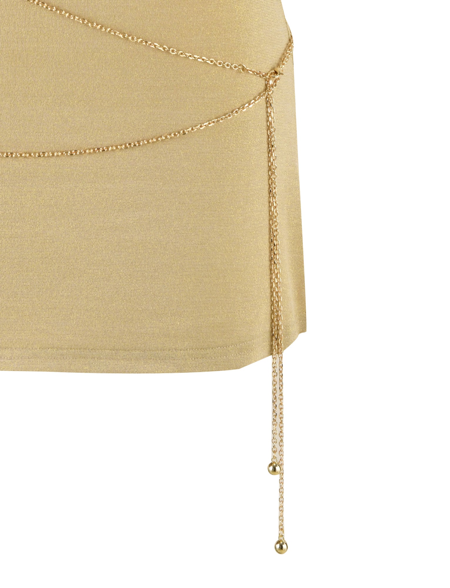 The OPELI DRESS in gold from TIGERMIST features a close-up of its exquisite fabric, adorned with two gold chains that drape diagonally around the waist area. These chains are connected and hang down decoratively, each ending with a small gold ball ornament. Together, the fabric and chains create an opulent and elegant appearance.