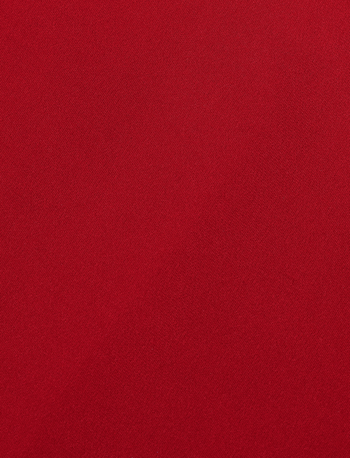 A close-up of the soft jersey fabric with a subtle diagonal weave used in the TIGERMIST DANIELA DRESS - RED.