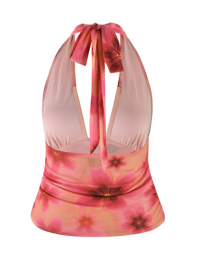 The FRANCIS TOP - MULTI : OMBRE : FLORAL by TIGERMIST features a vibrant pink and orange floral print. This halter-neck top ties at the back and showcases a summery design with a low-cut V neckline, fitted waist, and bodycon fit for a flattering silhouette. The mesh fabric adds an extra touch of elegance to this must-have wardrobe piece.