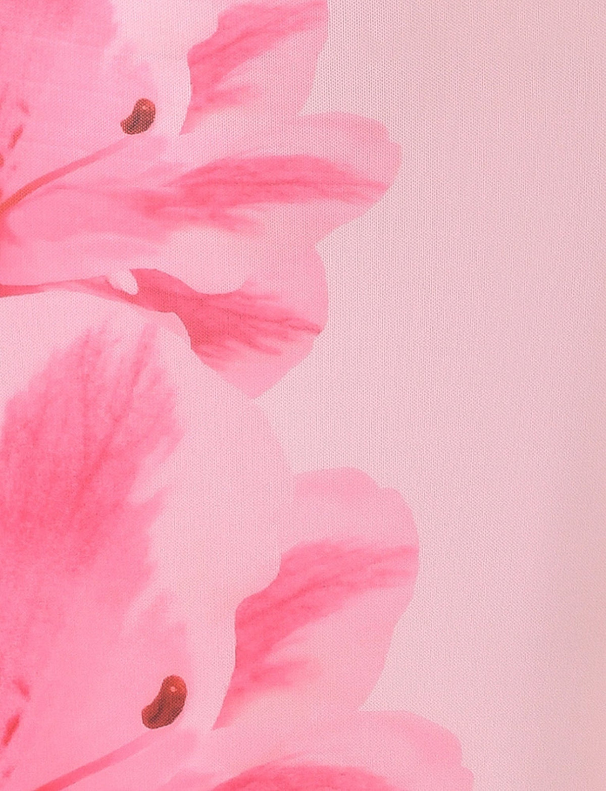 Close-up view of the TIGERMIST KARTER DRESS - PINK : BABY PINK fabric. The design showcases soft, large flowers in varying shades of pink, with visible petals and dark centers on a light pink background. The mesh fabrication enhances its delicate and airy appearance.