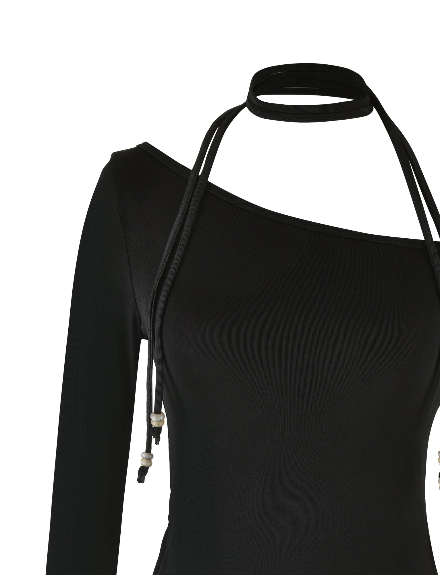 A detailed close-up of the MIETTA TOP - BLACK by TIGERMIST reveals an asymmetrical neckline and multi-tie neck halter-style straps elegantly wrapped around the neck. The high-stretch fabric exudes both softness and flexibility, highlighting a chic, contemporary design.