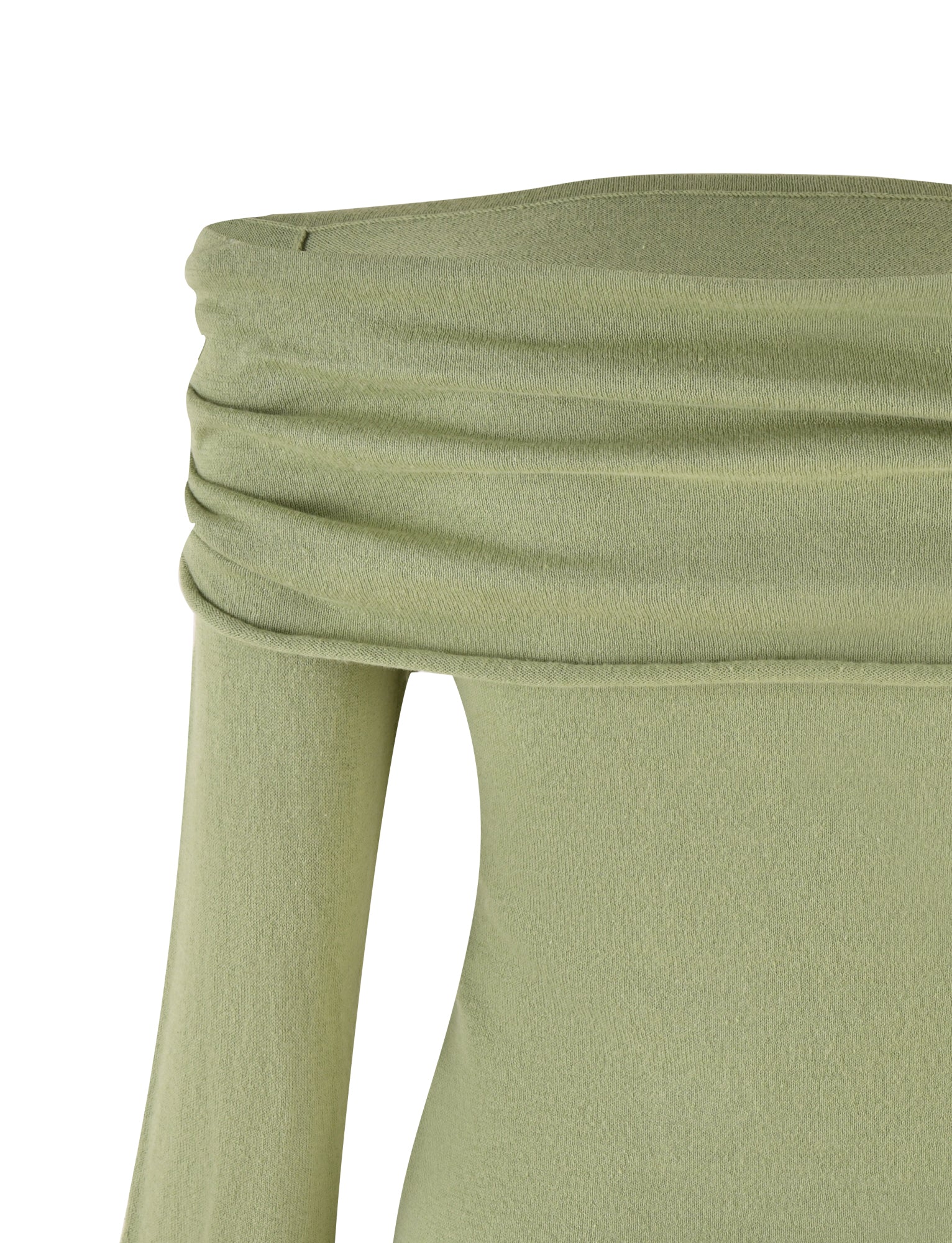 A close-up image of the DIEDRE JUMPER - GREEN by TIGERMIST, featuring its light green color and high-stretch fabric. The soft, slightly textured material creates a gentle drape. The image captures the elegance of the off-shoulder neckline and one long sleeve, showcasing the sophisticated design reminiscent of this stylish piece.