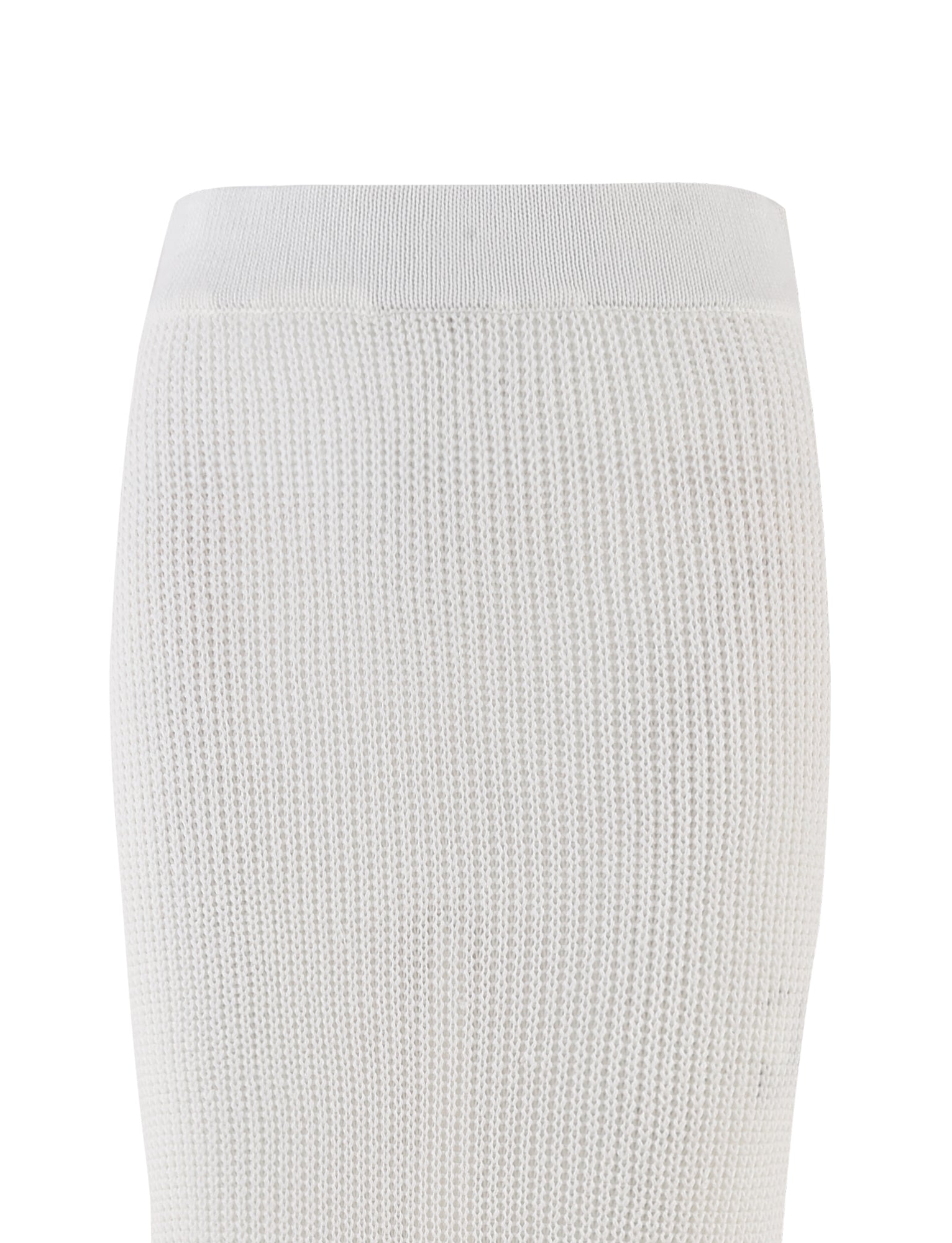 An up-close look at the RAMSEY SKIRT - WHITE by TIGERMIST reveals its textured knit design featuring an elasticated waistband. The fabric is stretchy with a subtle, intricately woven pattern, showcasing the upper portion of this crochet skirt against a simple background.