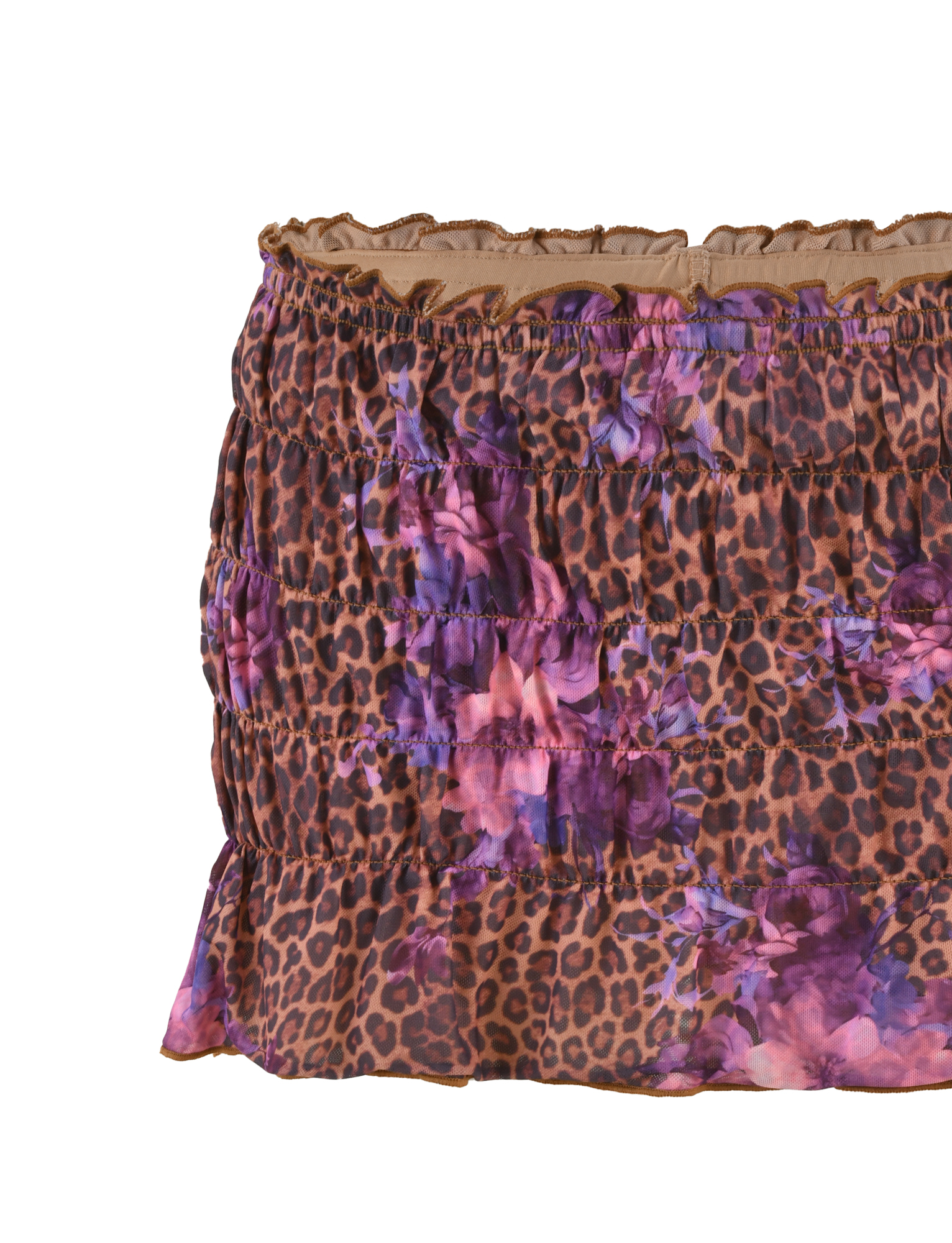 The TIGERMIST HOLLIS SKORT in Neutral Floral Leopard features elasticated shirring at its ruffled waistband and a gathered, textured fabric with a brown leopard and floral print.