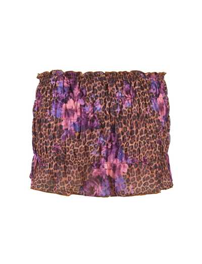 The TIGERMIST HOLLIS SKORT is a strapless, ruched mini skirt in a high-stretch fabric, showcasing a neutral floral leopard print with purple and pink accents, displayed on a white background.