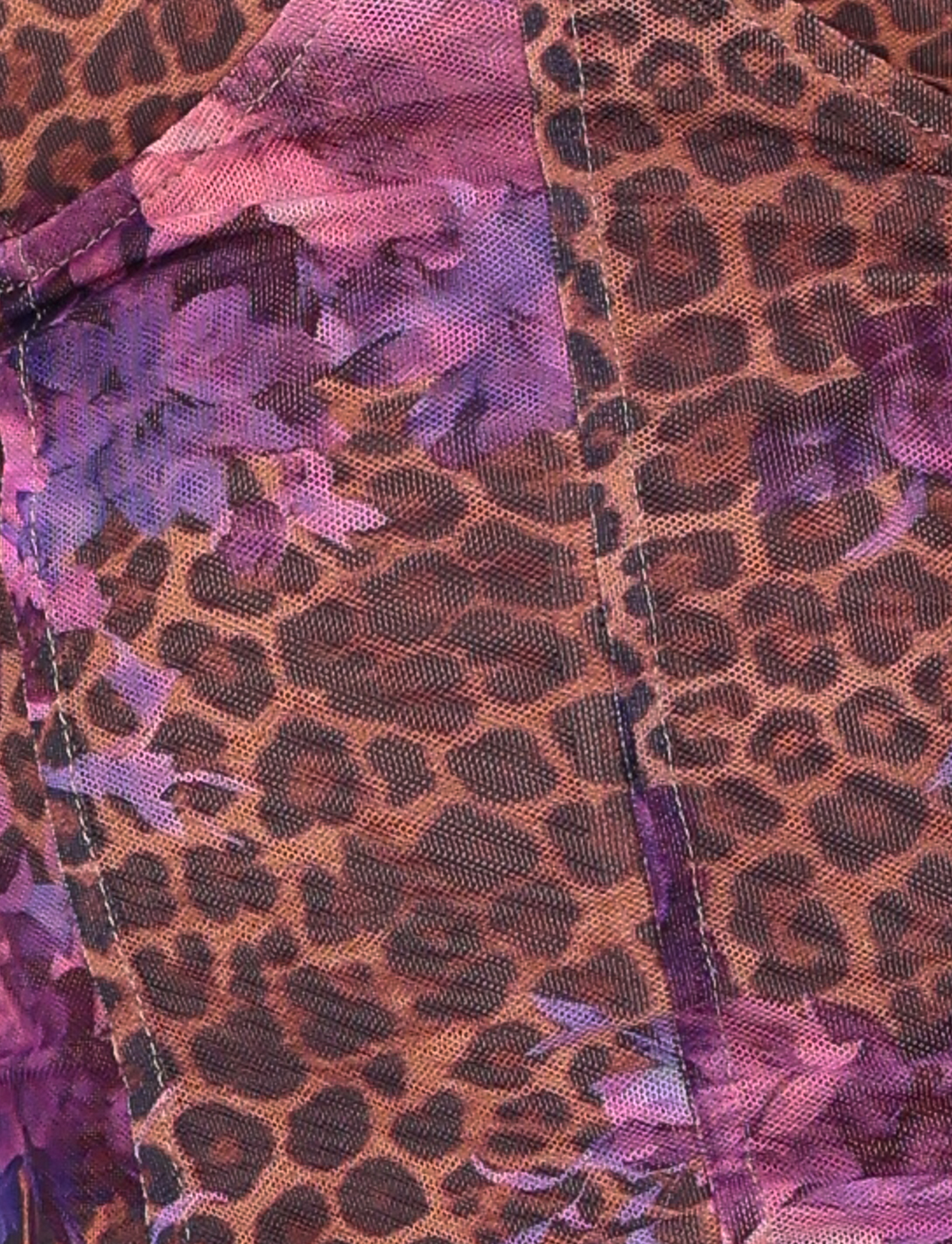 Close-up of the TIGERMIST HOLLIS TOP in Neutral Floral Leopard, a tailored-fit corset with brown and black leopard print, vibrant purple and pink accents, and visible stitched seams.