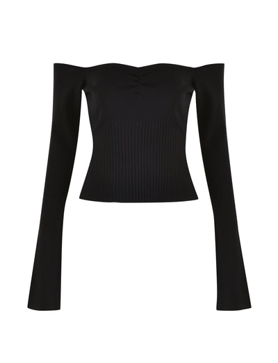 The LILYANA LONG SLEEVE TOP in black by TIGERMIST is an off-the-shoulder design with long sleeves, showcasing a fitted, ribbed texture and subtle gathering at the center of the neckline to highlight its exquisite rib detail.