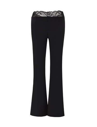 The NYOMI PANT - BLACK by TIGERMIST features black, high-waisted flares made from a high-stretch fabric, with delicate lace trimming at the waistband, showcased against a plain white background.