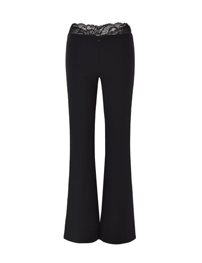 NYOMI PANT - BLACK by TIGERMIST, featuring flared legs and a lace-trimmed waistband, made from high stretch fabric, displayed on a white background.