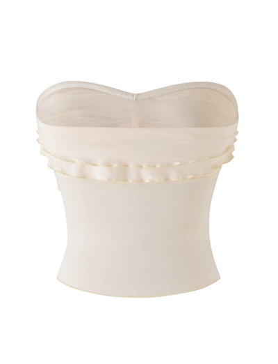 The DENALI BOOB TUBE - NEUTRAL : BONE by TIGERMIST is a strapless cream bandeau with stretchy satin-like fabric and subtle horizontal pleats near the top, shown against a white background.