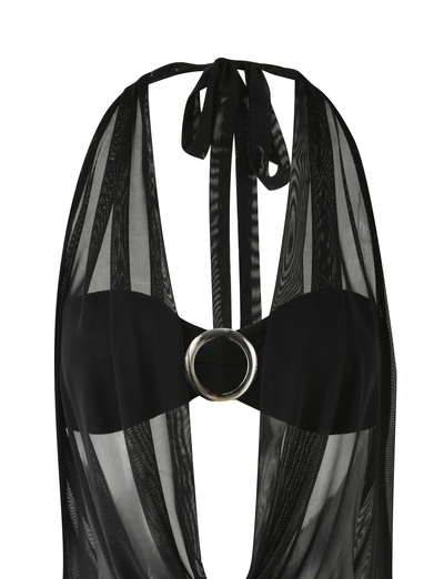 A close-up of the TIGERMIST MAKENA TWO-PIECE DRESS in black, featuring a cowl neck halter style, sheer striped fabric, a deep plunging neckline, and a large metallic ring at the center of the chest.