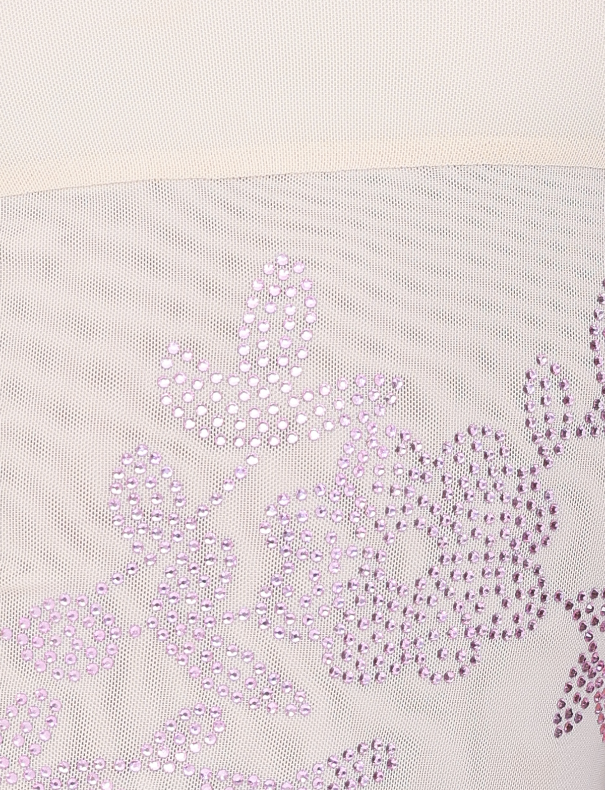 Close-up of the OCTAVIA TOP - NEUTRAL : CREAM by TIGERMIST, featuring sheer white mesh with light purple sequin floral and leaf patterns for a delicate, decorative look.
