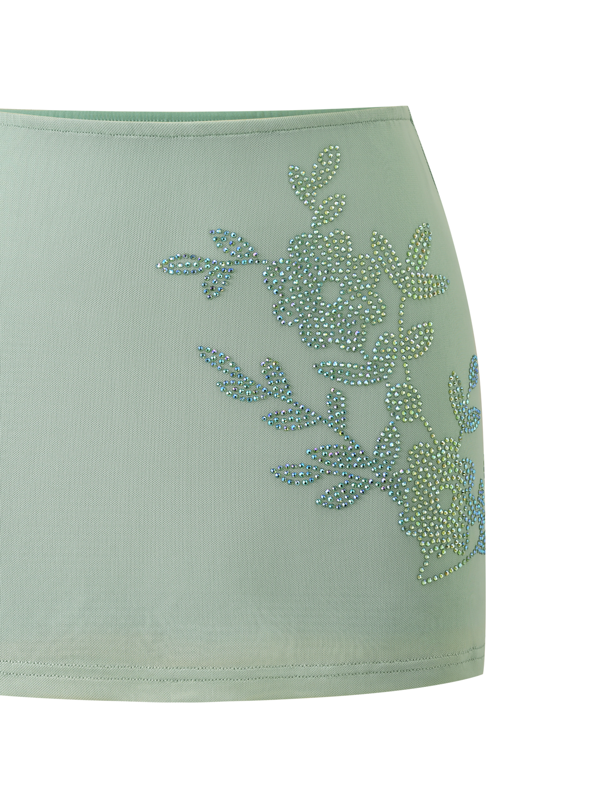 The TIGERMIST OCTAVIA MINI SKIRT in pistachio features blue and silver rhinestone floral embellishments on one side, shown against a plain white background.