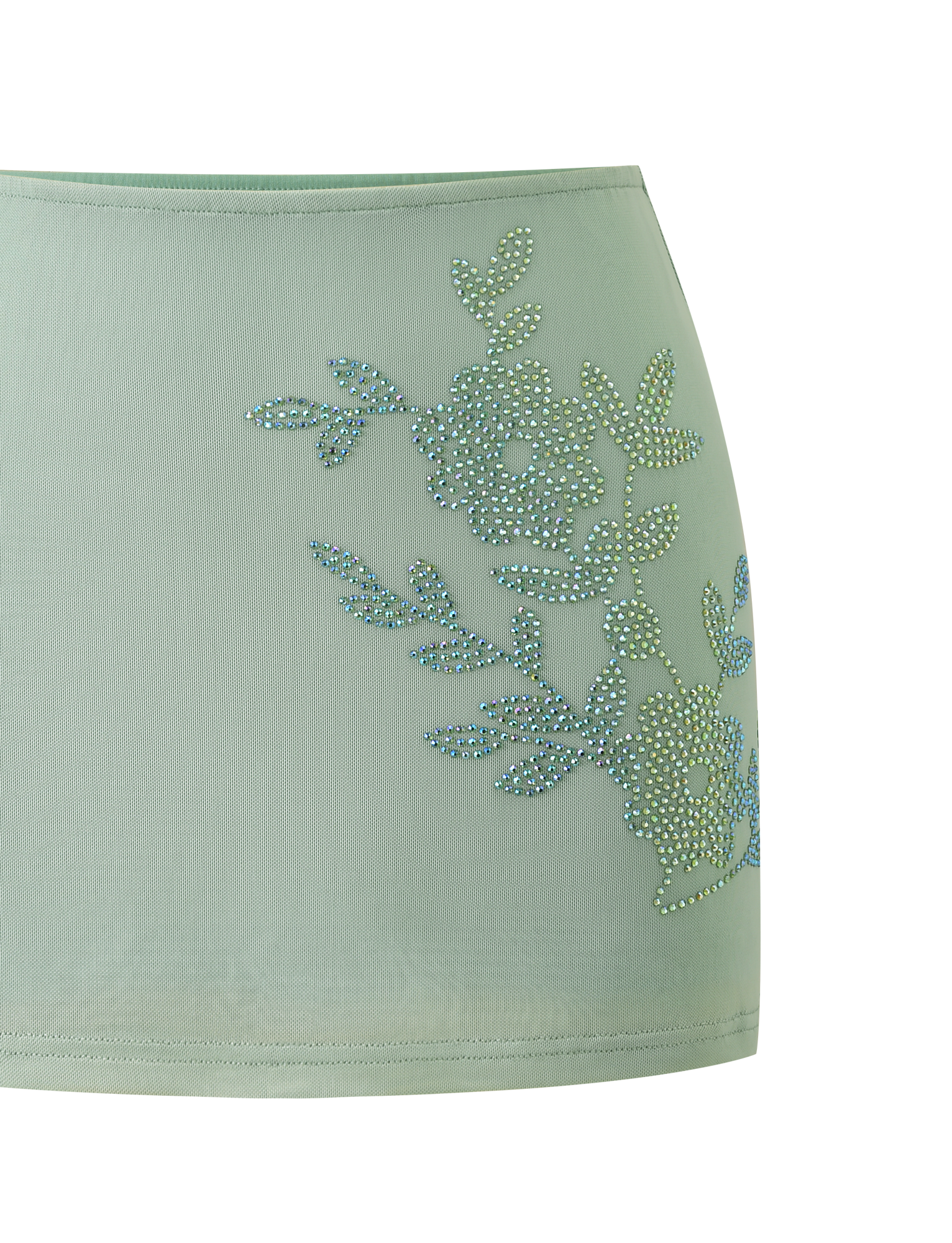 The TIGERMIST OCTAVIA MINI SKIRT in pistachio features blue and silver rhinestone floral embellishments on one side, shown against a plain white background.
