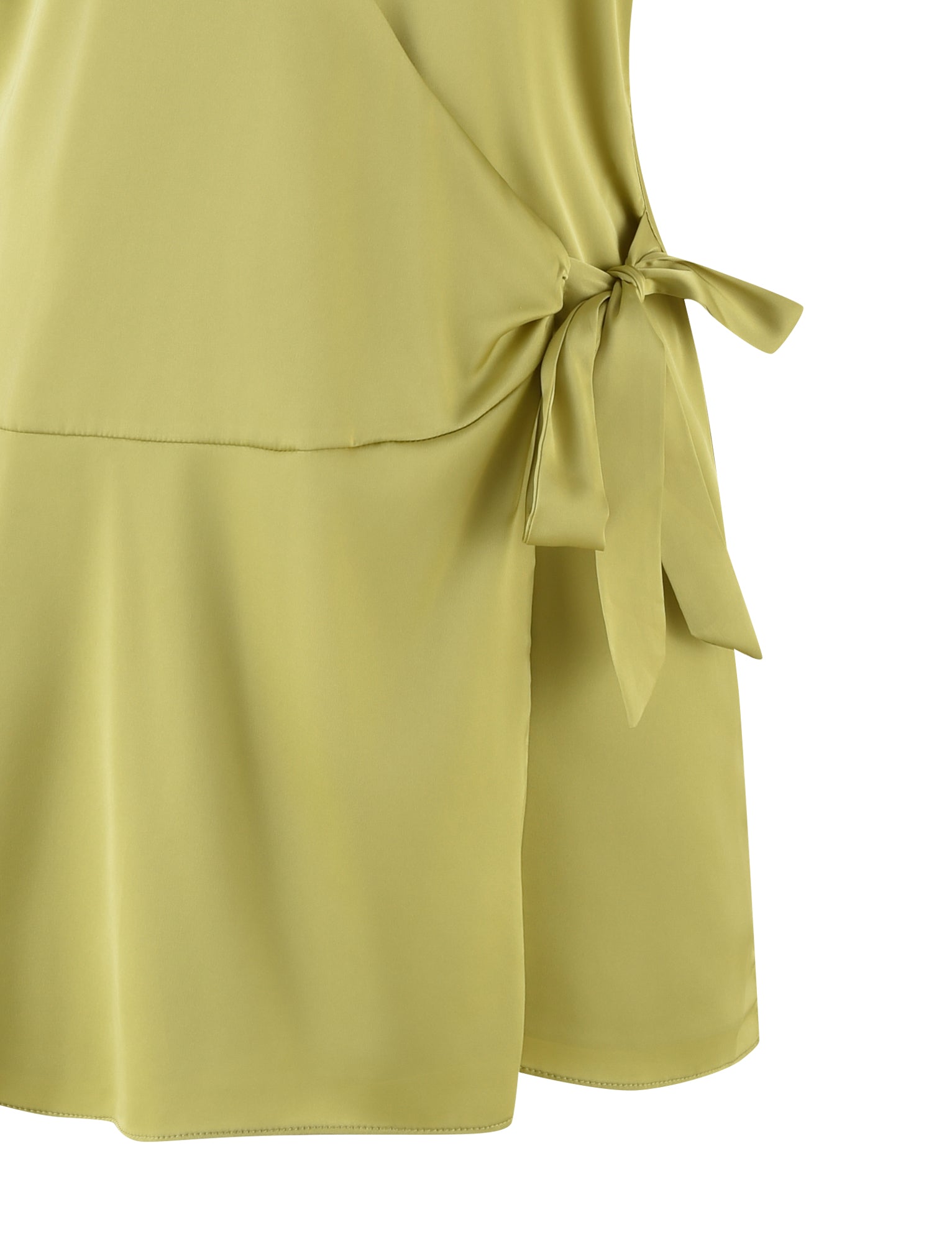 Close-up of the MONROE 2.0 MINI DRESS in Pistachio by TIGERMIST, showcasing a side bow detail. This satin wrap dress features smooth, subtly shiny fabric and a layered design.