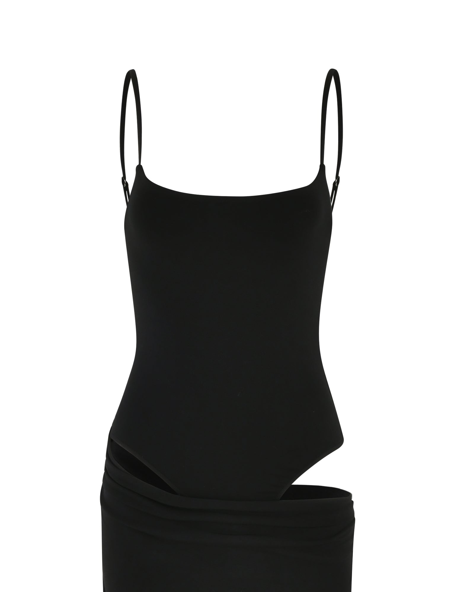 The UMA DRESS - BLACK by TIGERMIST is a black sleeveless bodysuit with adjustable spaghetti straps and a high-cut leg design, shown on a plain white background.
