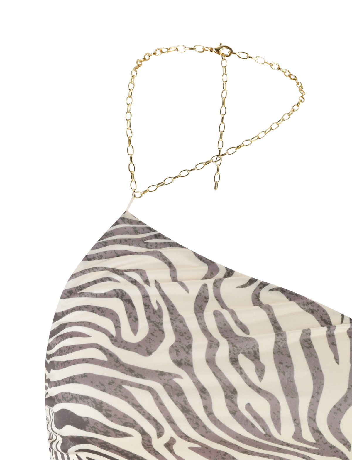 A close-up of the TIGERMIST LYRA TOP – NEUTRAL: ZEBRA, featuring a zebra print, thin gold chain straps, and a sleek body-con fit against a striped background.