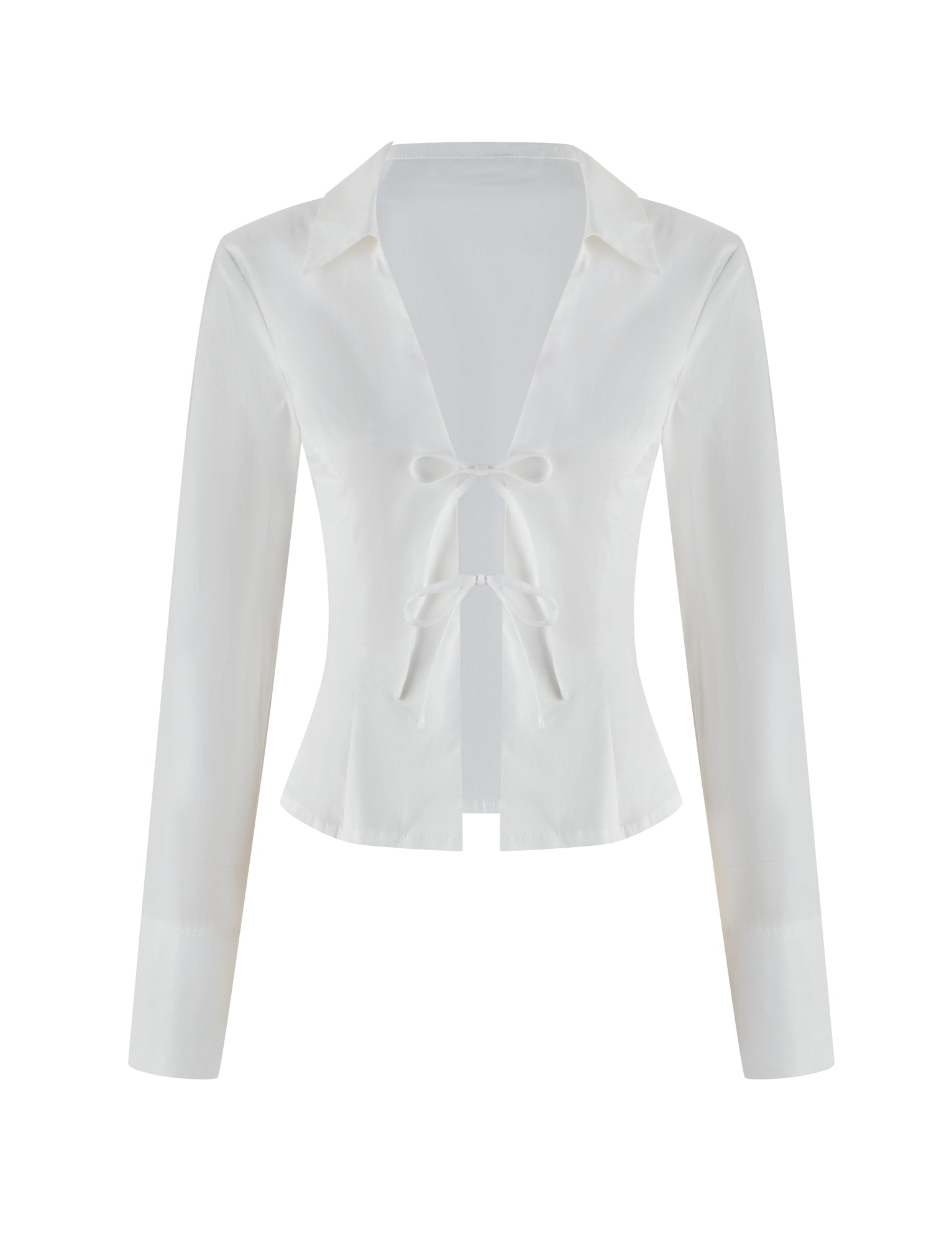 The BRIELLE SHIRT - WHITE by TIGERMIST is a white long-sleeve blouse with a deep V-neck and two front bow ties, offering a minimalistic, elegant design. Its soft stretch fabric is smooth, slightly glossy against the plain white background, and features a classic collar to accentuate its sophisticated charm.