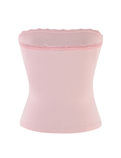 The MIRELLE TOP - PINK by TIGERMIST features a pastel pink, seamless tube design with a straight neckline and delicate lace trim, styled on a plain white background. The fabric looks smooth and slightly stretchy.